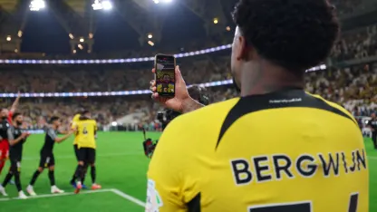 Steven Bergwijn celebrates Al Ittihad win v Al Nassr with fans
