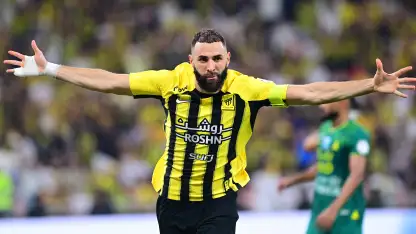 Benzema celebrates scoring for Al Ittihad v Al Khaleej
