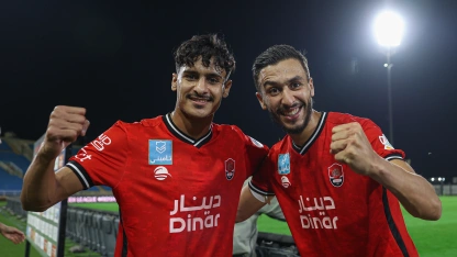 Al Raed players celebrate