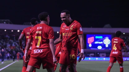 Pierre-Emerick Aubameyang and Turki Al Ammar celebrate for Al Qadsiah v Al Nassr