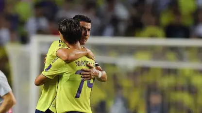Cristiano Ronaldo and Joao Felix celebrate latter's goal in Saudi Super Cup semi-final win v Al Ittihad