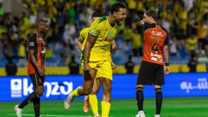 Joshua King celebrates one of his three goals for Al Khaleej v Al Riyadh