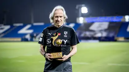 Jorge Jesus holding the RSL 2023-24 Manager of the Season award