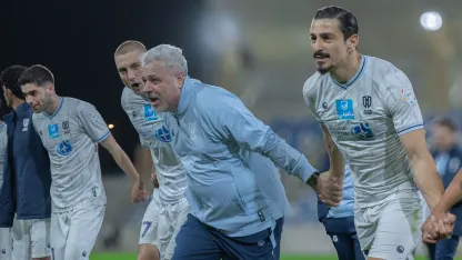 Al Okhdood celebrate home win v Al Kholood
