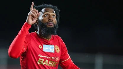 Georges Kevin Nkoudou celebrates