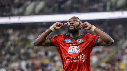 Karl Toko Ekambi celebrates scoring for Al Ettifaq against Al Ittihad