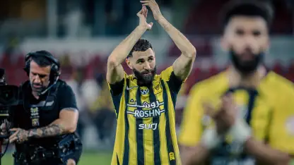 Al Ittihad captain Karim Benzema celebrates win v Al Fayha