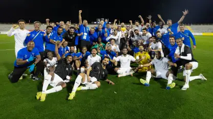 NEOM celebrate securing promotion to RSL