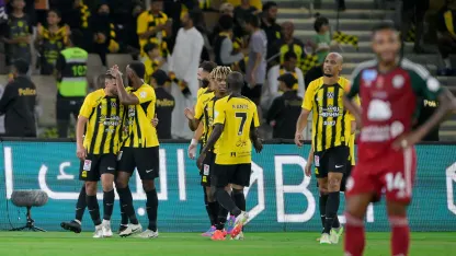 Al Ittihad celebrate winner v Al Ettifaq