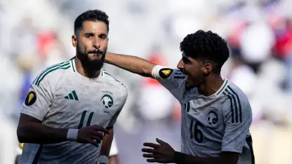 Saudi Arabia's Saleh Al Shehri (L) celebrates winner v Haiti in CONCACAF Gold Cup with Ziyad Al Johani