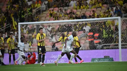 Christian Bassogog lashes home injury-time equaliser for Al Okhdood at Al Ittihad