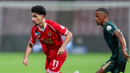 Iraq star Youssef Amyn (L) in action for Al Wehda