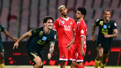 Alex Collado celebrates scoring for Al Kholood v Al Wehda