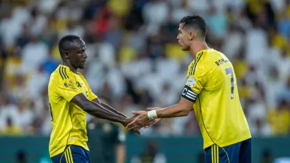 Sadio Mane and Cristiano Ronaldo celebrate for Al Nassr v Al Kholood