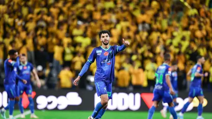 Salem Al Najdi Al Fateh player celebrating against Al Taaqoun