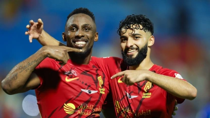 Julian Quinones and Mohammed Abu Al Shamat of Al Qadsiah celebrate against Al Fateh