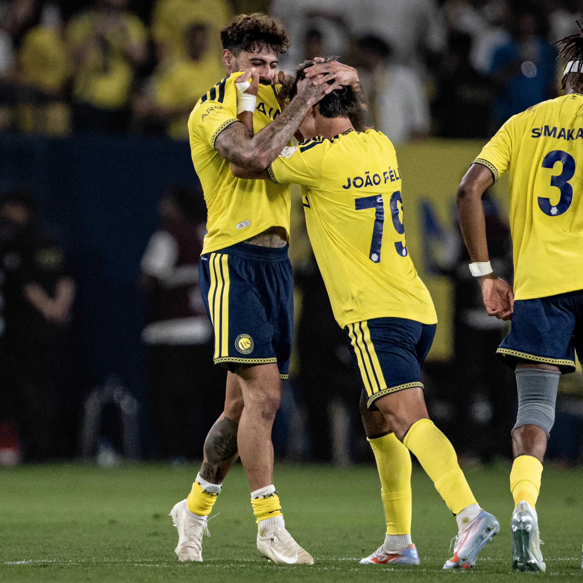 Joao Felix and Samu Costa celebrate wildly after equalizer v Al Taawoun