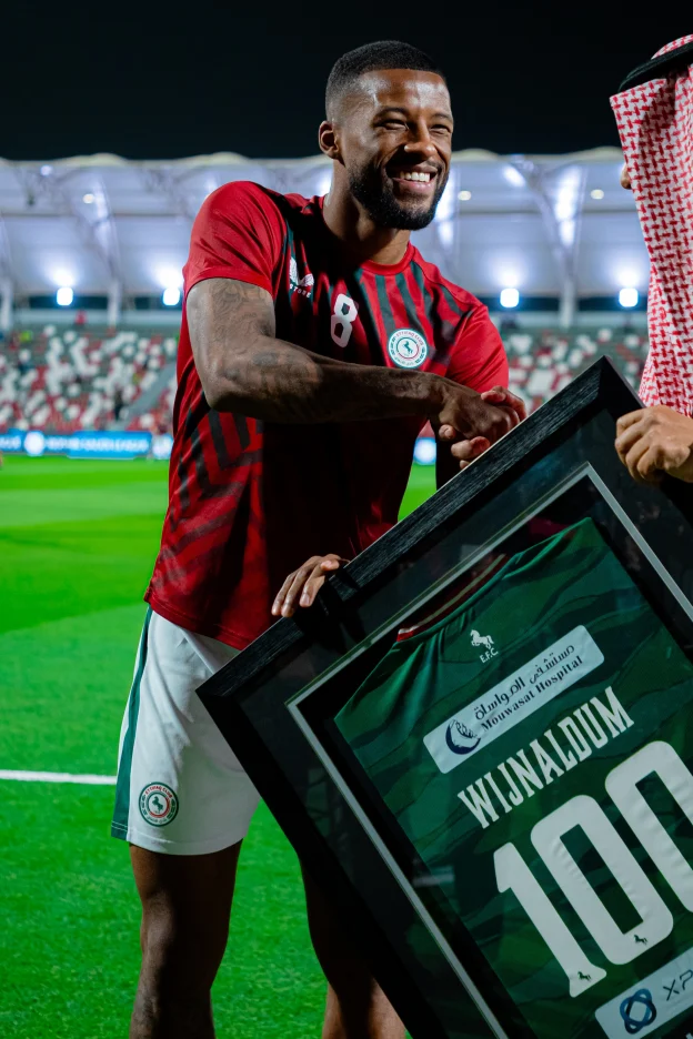 Georginio Wijnaldum celebrating 100 appearances for Al Ettifaq